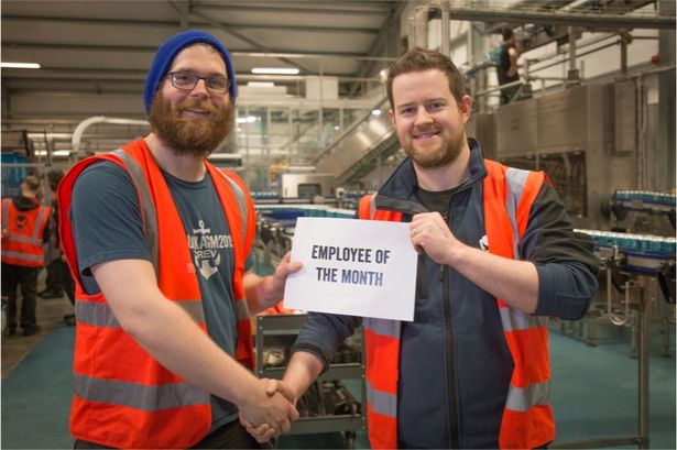 A proud Graeme receives the award following the prank. Picture: Brewdog