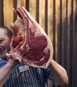 Graeme carrying meat