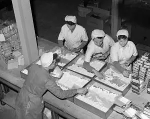Ferguson Edinburgh Rock, women packing the rock into tartan boxes. Picture: TSPL