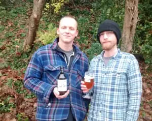 Simon Tardivel samples some of the beer with a colleague. Picture: TSPL
