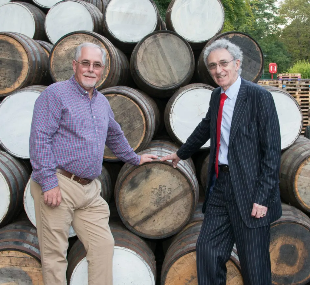 Eddie and Dennis pose with an ex Wild Turky cask. Picture: Alex Mitchell