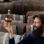 Scottish company achieves world first with unique gin blend featuring gin aged in oak barrels for 10 years