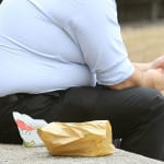 Overweight people 'react differently to real food and images of snacks'