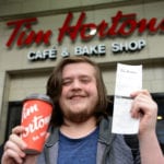 Man queues all night to be the first to win year's supply of Tim Hortons' coffee
