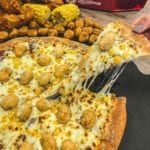 KFC and Pizza Hut team up to create new Popcorn Chicken Pizza - with gravy base
